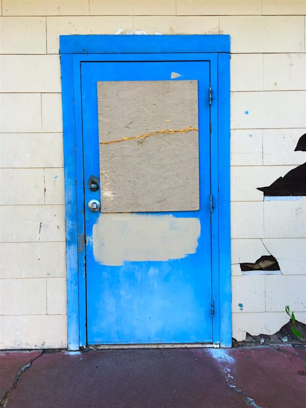 While on Walkies the other evening, the Girl and I came across this door. It opens into a building, but what's inside I do not know.